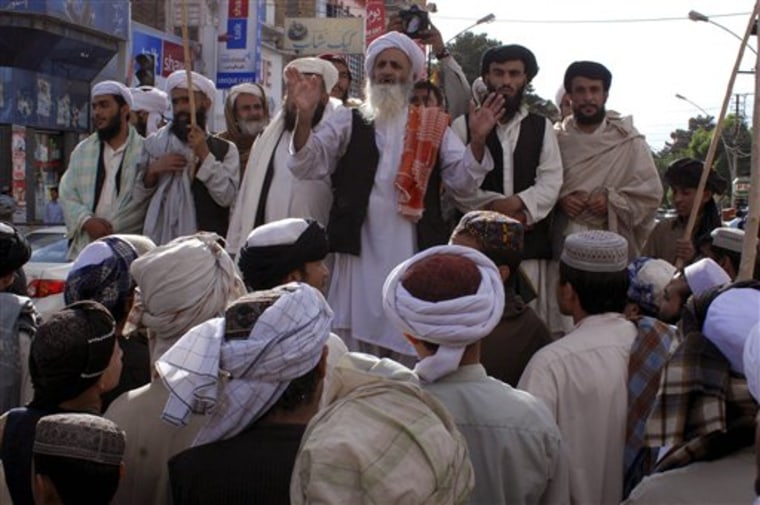 FILE - In this May 4, 2011 file photo, former Pakistani lawmaker and leader of a religious party Maulana Noor Mohammad addresses a rally  to condemn the killing of al-Qaida leader Osama bin Laden in Quetta, Pakistan. In life, Osama bin Laden was burned into the Muslim consciousness in countless ways: the lion of holy warriors, the untouchable nemesis of the West, the evil zealot who soiled their faith with blood and intolerance. In death, however, the voices across the Islamic world are now relatively muted in sharp counterpoint to the rage and shame or hero-worship that he long inspired. (AP Photo/Arshad Butt, File)